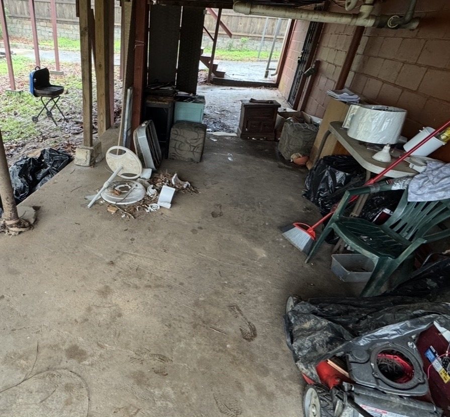 Before photo of an under-house cleanup